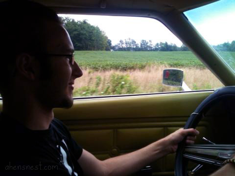 Tom driving the mustang