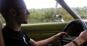 Tom driving the Mustang