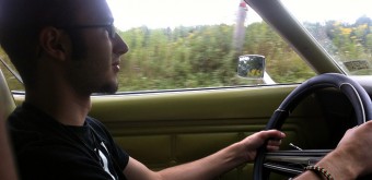 Tom driving the Mustang